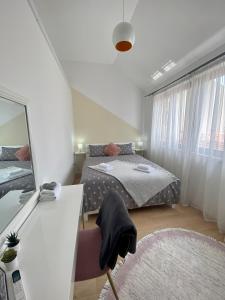 A bed or beds in a room at Dream Apartments