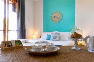 Posezení v ubytování Villa Curiazzi Guesthouse Viale la Pelosa 16