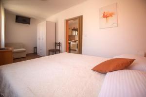 Postel nebo postele na pokoji v ubytování Guest House Franko