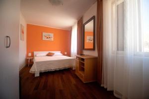 Postel nebo postele na pokoji v ubytování Guest House Franko