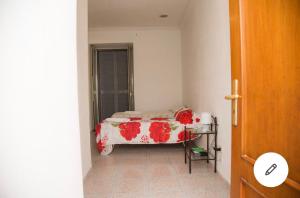 Ένα ή περισσότερα κρεβάτια σε δωμάτιο στο Camera Greta