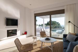 Posezení v ubytování VILLA IRIS in PEFKOS, PINE VILLAS