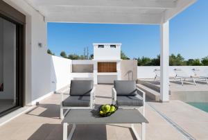 Balkón nebo terasa v ubytování VILLA IRIS in PEFKOS, PINE VILLAS