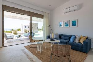 Posezení v ubytování VILLA IRIS in PEFKOS, PINE VILLAS