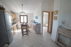 A kitchen or kitchenette at Villa da Luciana