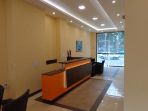 an office with a reception desk in a lobby at Къща за гости А. Б. В. in Nesebar