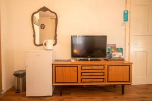 TV a/nebo společenská místnost v ubytování Guest House Franko