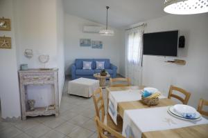 A television and/or entertainment centre at Villa da Luciana