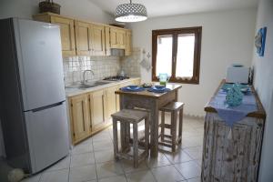 A kitchen or kitchenette at Villa da Luciana