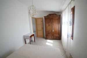 A bed or beds in a room at Villa da Luciana