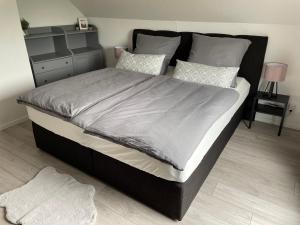 Ένα ή περισσότερα κρεβάτια σε δωμάτιο στο Ferienhaus Sonnendeck