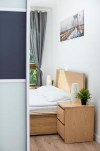 Posteľ alebo postele v izbe v ubytovaní Apartment Warsaw Business Center by Noclegi Renters