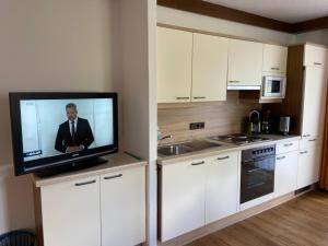 Kuchyň nebo kuchyňský kout v ubytování Appartement Hubner