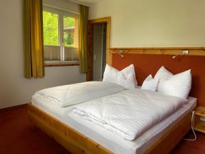 Postel nebo postele na pokoji v ubytování Appartement Hubner