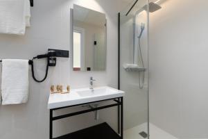Koupelna v ubytování Arena Zone Hotel