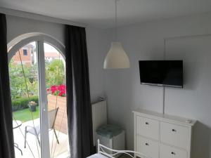 TV a/nebo společenská místnost v ubytování Marko Rooms