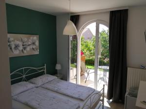 Postel nebo postele na pokoji v ubytování Marko Rooms