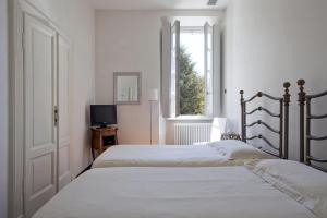 Posteľ alebo postele v izbe v ubytovaní La Canarina Bed & Breakfast