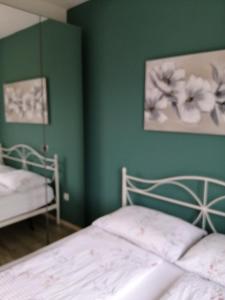 Postel nebo postele na pokoji v ubytování Marko Rooms