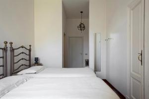 Posteľ alebo postele v izbe v ubytovaní La Canarina Bed & Breakfast