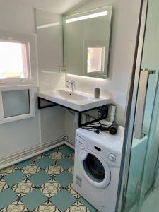 Кухня или мини-кухня в Appartement Prox Lycée Arago

