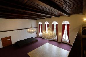 Ένα ή περισσότερα κρεβάτια σε δωμάτιο στο Hotel Magnolia
