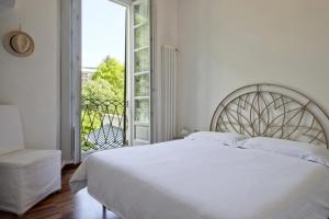 Posteľ alebo postele v izbe v ubytovaní La Canarina Bed & Breakfast