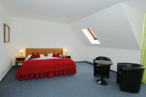 Ένα ή περισσότερα κρεβάτια σε δωμάτιο στο Hotel Magnolia