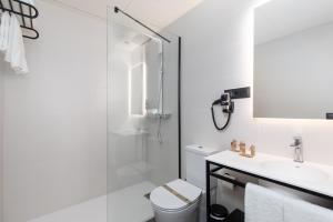 Koupelna v ubytování Arena Zone Hotel