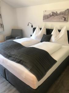 Postel nebo postele na pokoji v ubytování Landhaus Elto