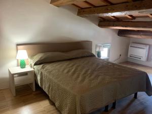 Postel nebo postele na pokoji v ubytování Relais Mevigo - Casa Padronale