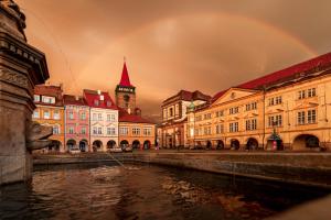 a rainbow over a city with a river and buildings at Rezidence U prince č.3 in Jičín