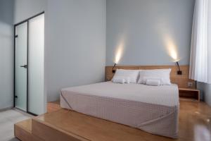 Postel nebo postele na pokoji v ubytování Twin Circle Athens