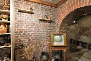 TV a/nebo společenská místnost v ubytování MM Marani
