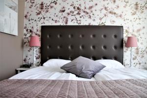 Postel nebo postele na pokoji v ubytování Best Western Vetlanda Stadshotell