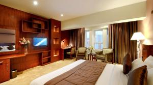 TV a/nebo společenská místnost v ubytování Almsakn Alola Hotel Company + 32 fotografií