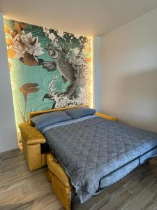 A bed or beds in a room at Karpa House