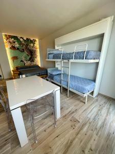 A bed or beds in a room at Karpa House