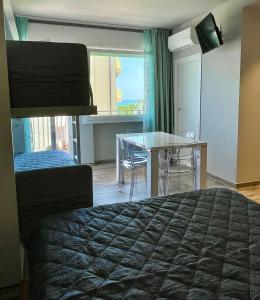 A bed or beds in a room at Karpa House
