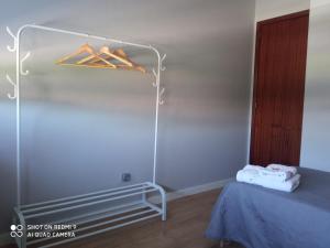Łóżko lub łóżka w pokoju w obiekcie Ecorooms PADRÓN