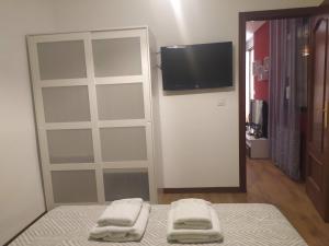 TV a/nebo společenská místnost v ubytování Vivienda de Uso Turistico Ramos 3