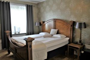 Postel nebo postele na pokoji v ubytování Best Western Vetlanda Stadshotell