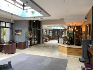Lobby alebo recepcia v ubytovaní Twin Trees Hotel & Leisure Club