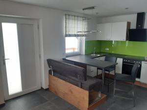 Kuchyňa alebo kuchynka v ubytovaní Haus Santner + 13 fotografií