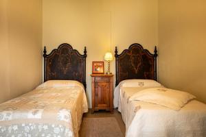 Postel nebo postele na pokoji v ubytování B&B Villa le Ortensie