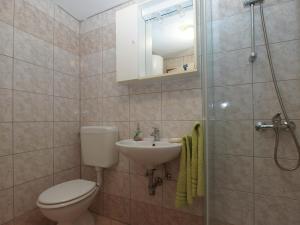Koupelna v ubytování Apartments Klaudio 1318