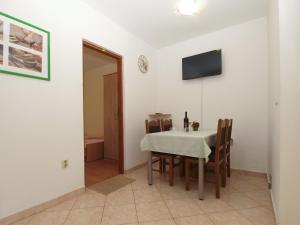 TV a/nebo společenská místnost v ubytování Apartments Klaudio 1318