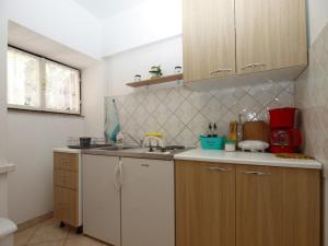 Kuchyň nebo kuchyňský kout v ubytování Apartments Klaudio 1318