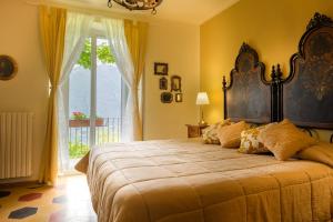 Postel nebo postele na pokoji v ubytování B&B Villa le Ortensie