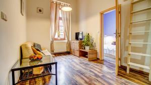 TV a/nebo společenská místnost v ubytování Boromeum Residence